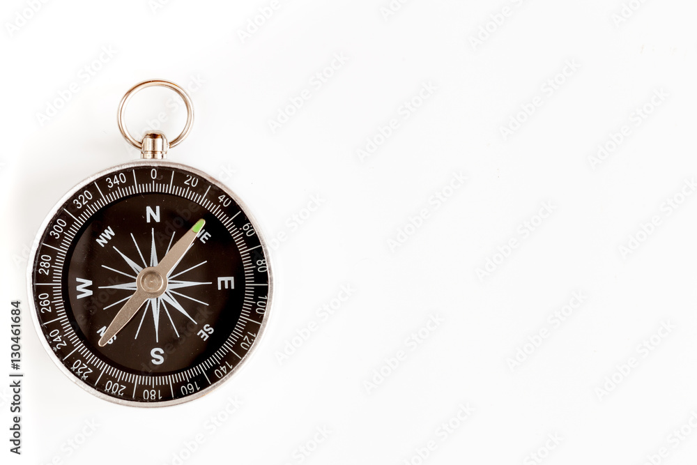 compass on white background concept - direction motion top view