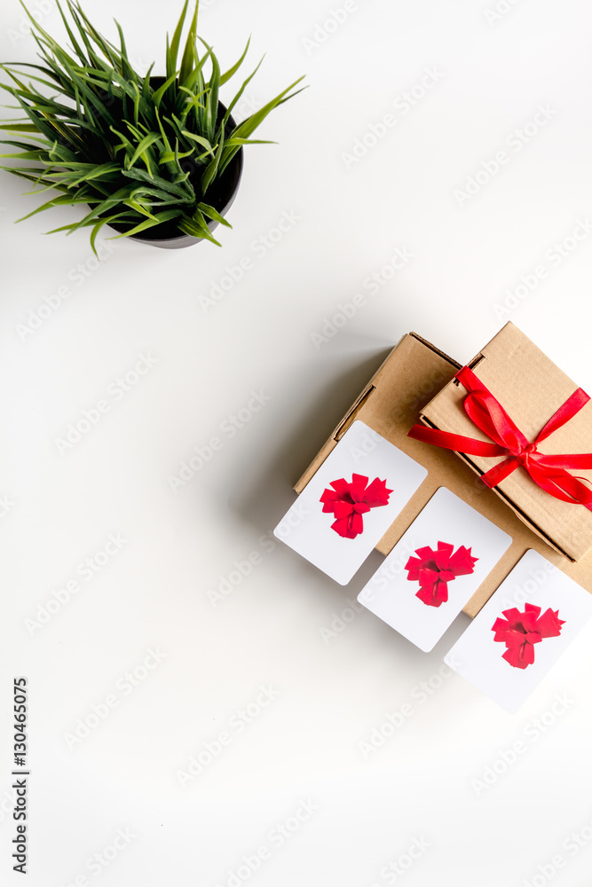 concept of gift cards on white background top view