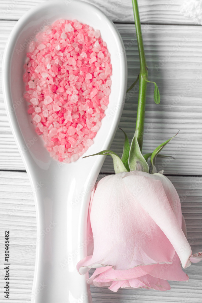 organic cosmetic with rose oil on wooden background top view