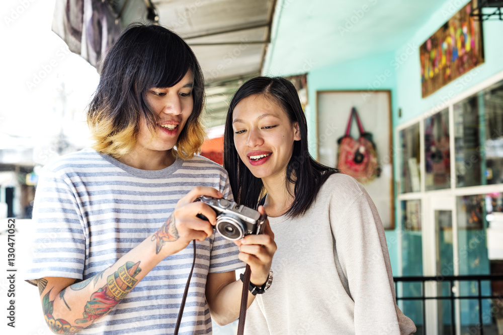 Couple Checking Photos Camera Concept