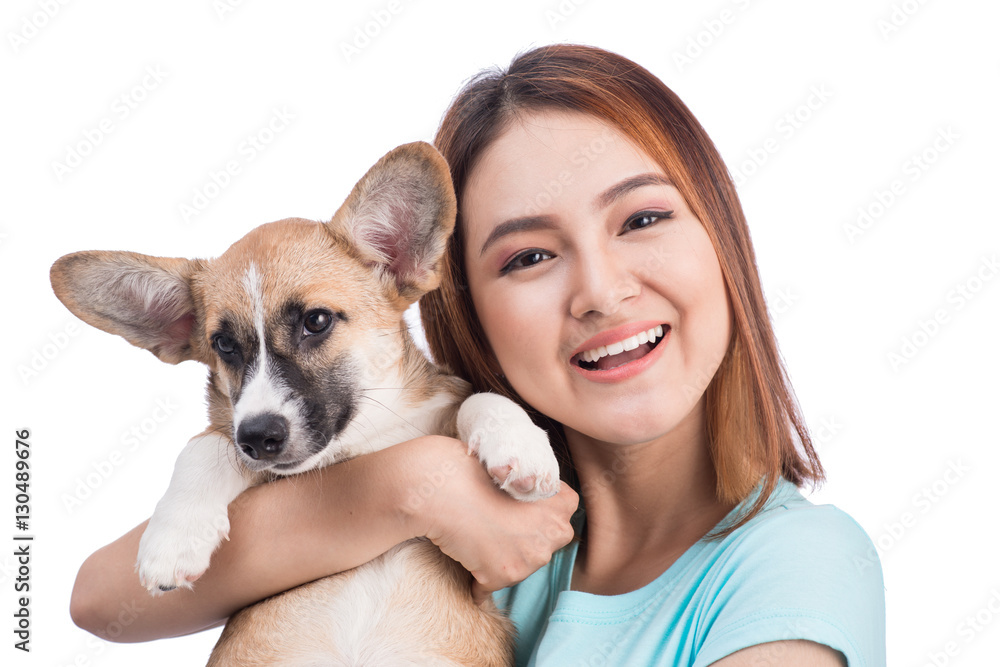 Young asian woman with a little puppy isolated over a white back