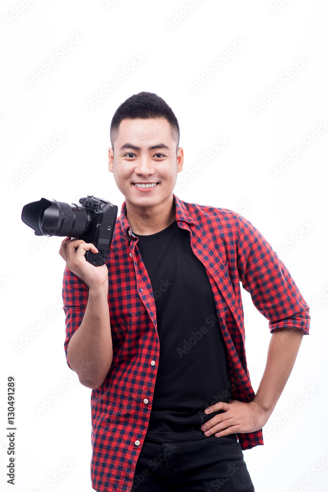 Professional photographer. Portrait of confident young man in sh