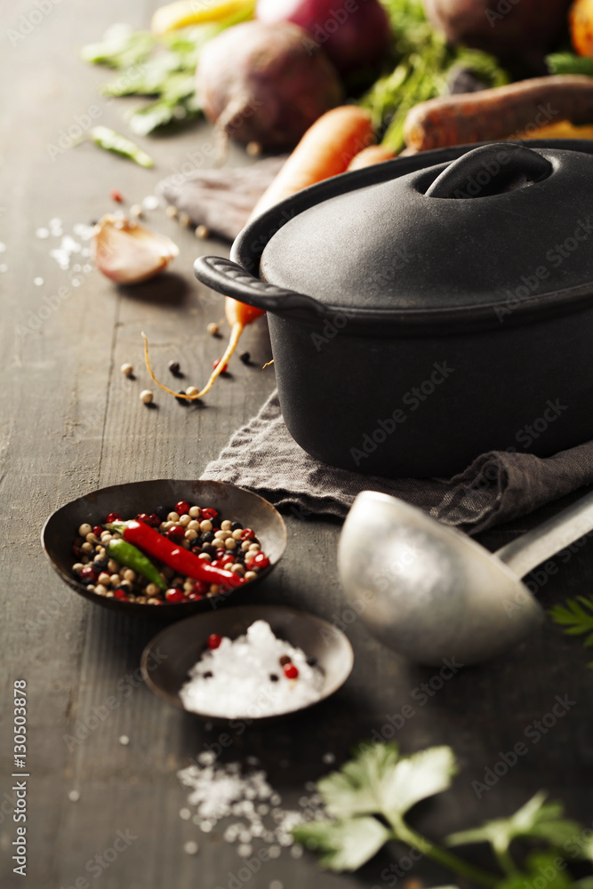 Cast iron pot and vegetables