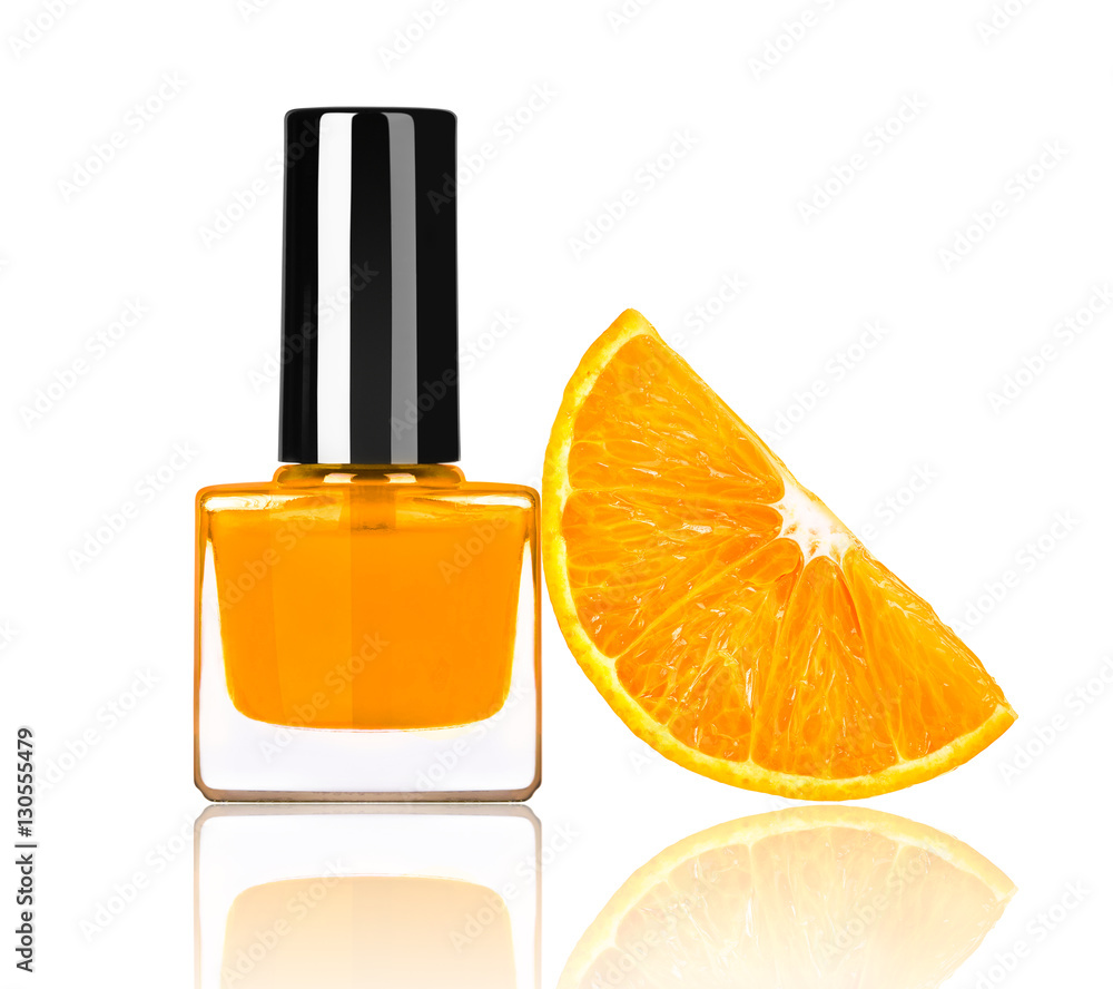 bright nail polish with a slice of orange isolated on white back