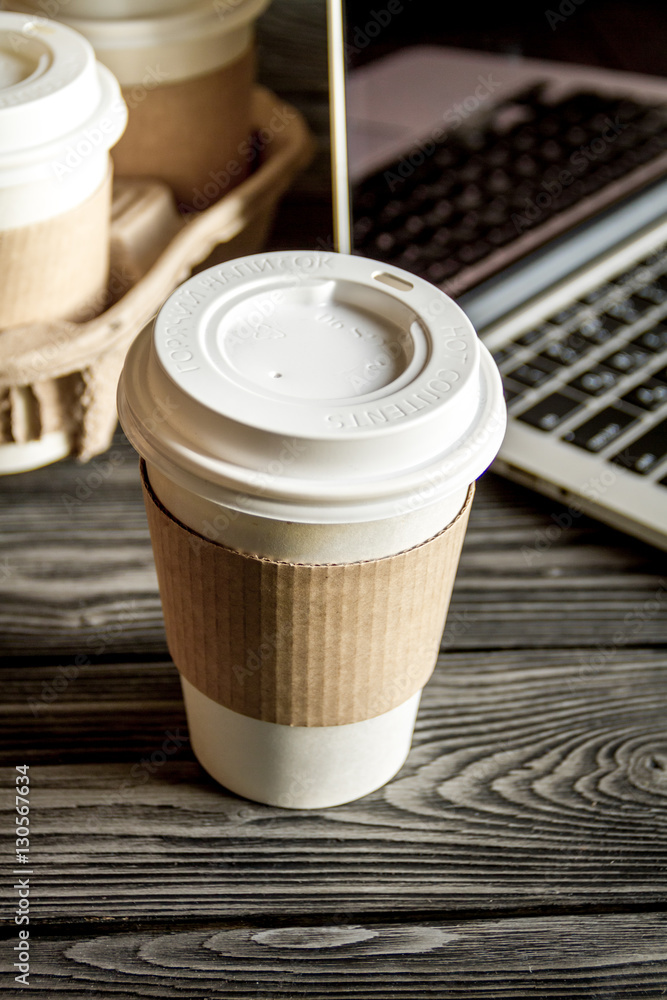 coffee cup take away at wooden background