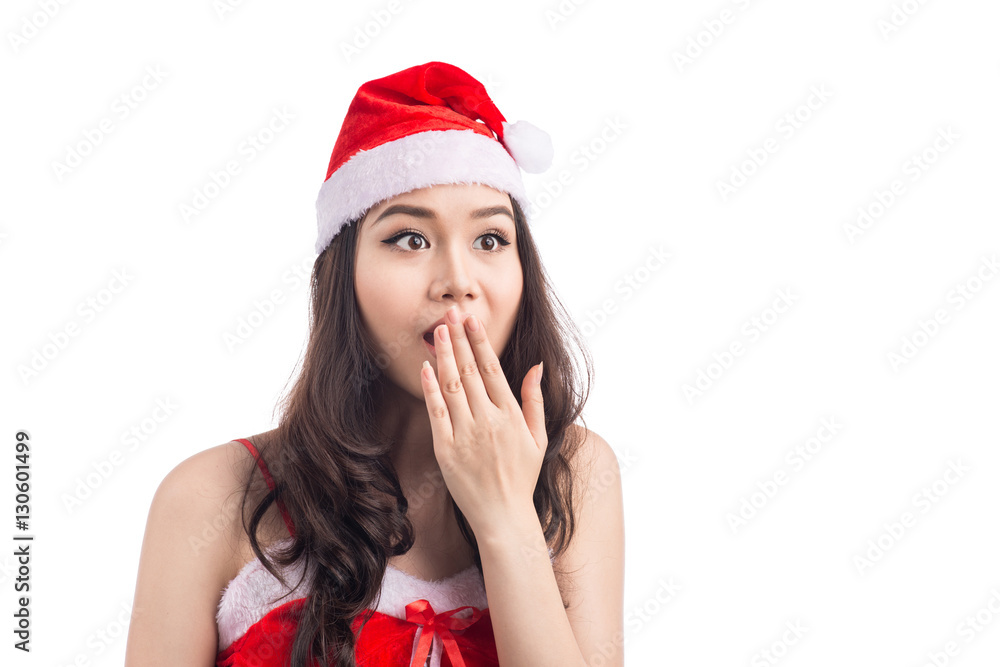 Surprised Beauty Asian Model Girl in Santa Hat isolated on White