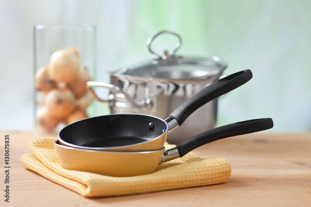 cooking equipment on wooden table