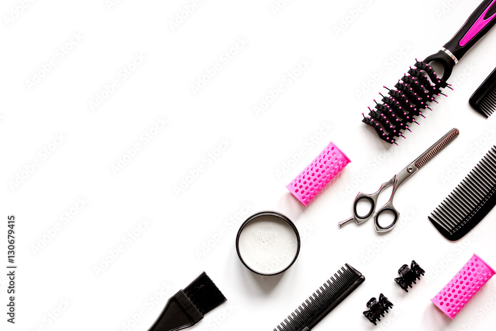 Tools for hair styling on white background top view