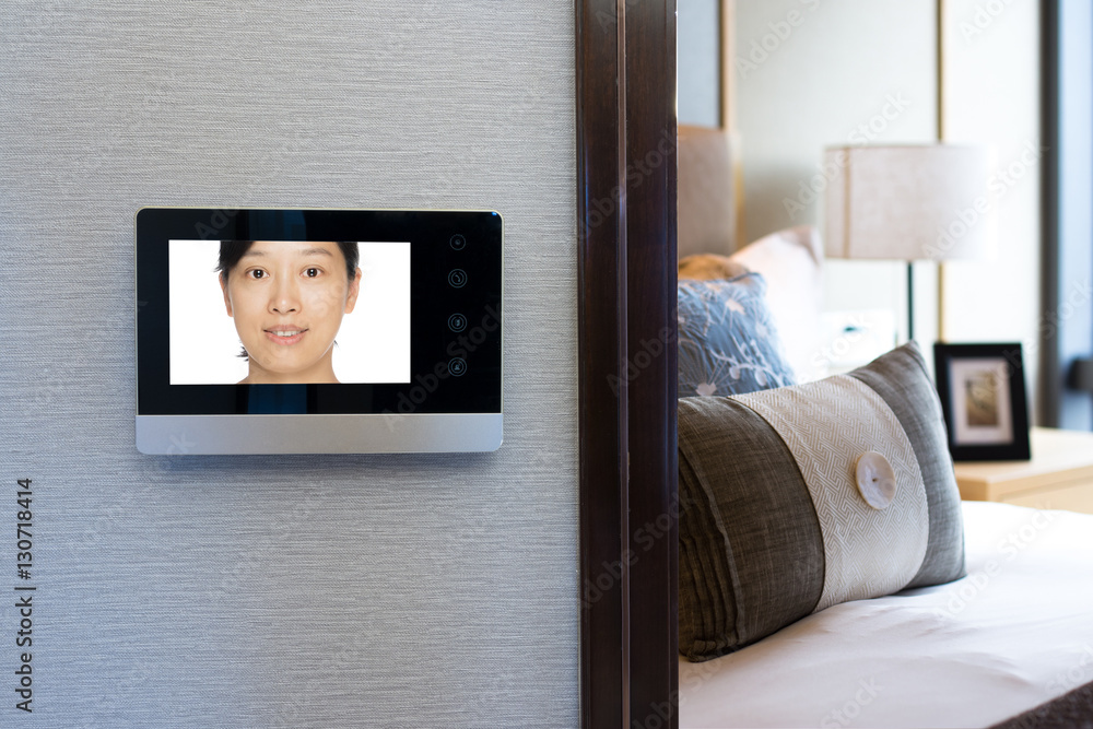 intercom video door bell on the wall outside modern bedroom