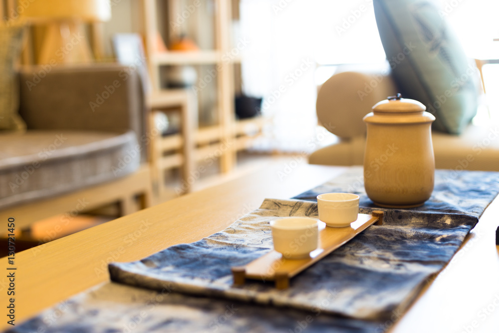 elegant ceramic tea sets on table in modern living room