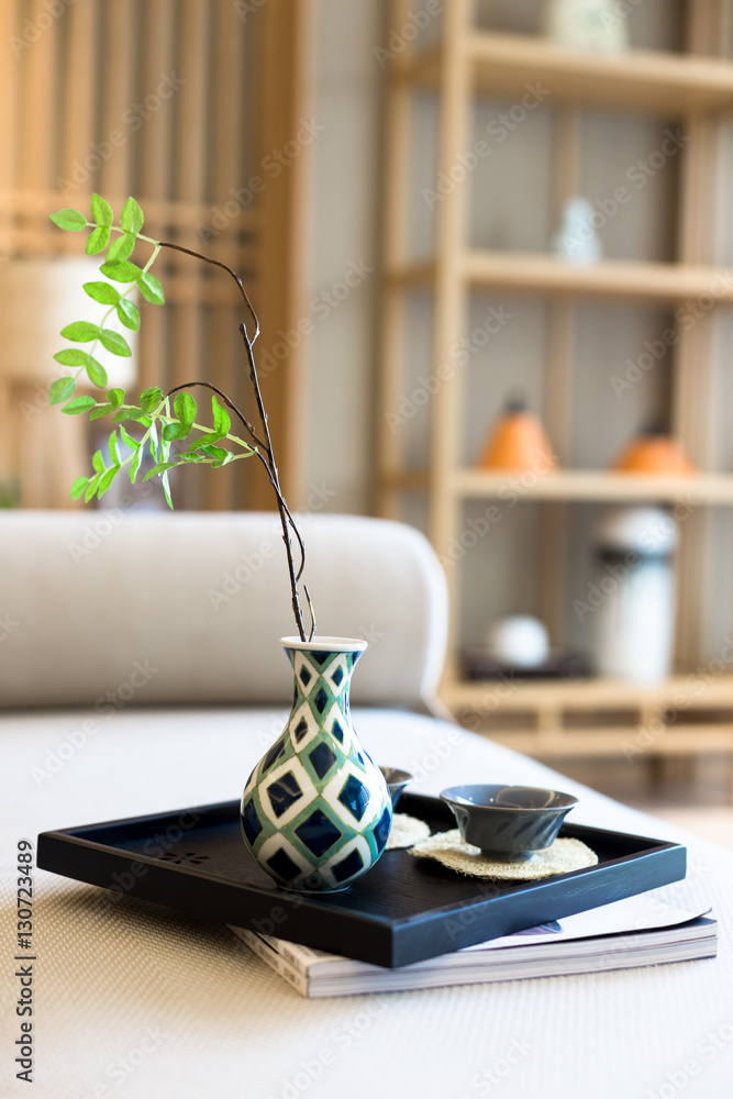 elegant ceramic tea sets on table in modern living room