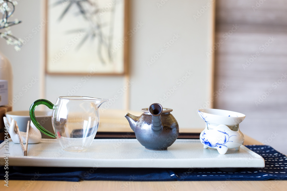 elegant ceramic tea sets on table in modern living room