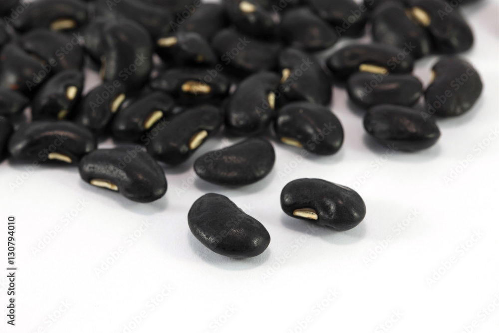 a lot of black bean on white background