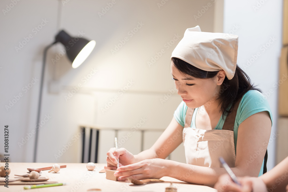 woman woodworking smile happily