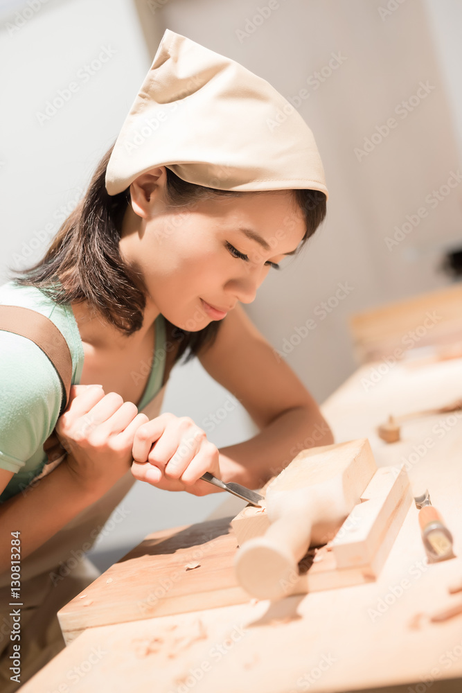 woman woodworking smile happily