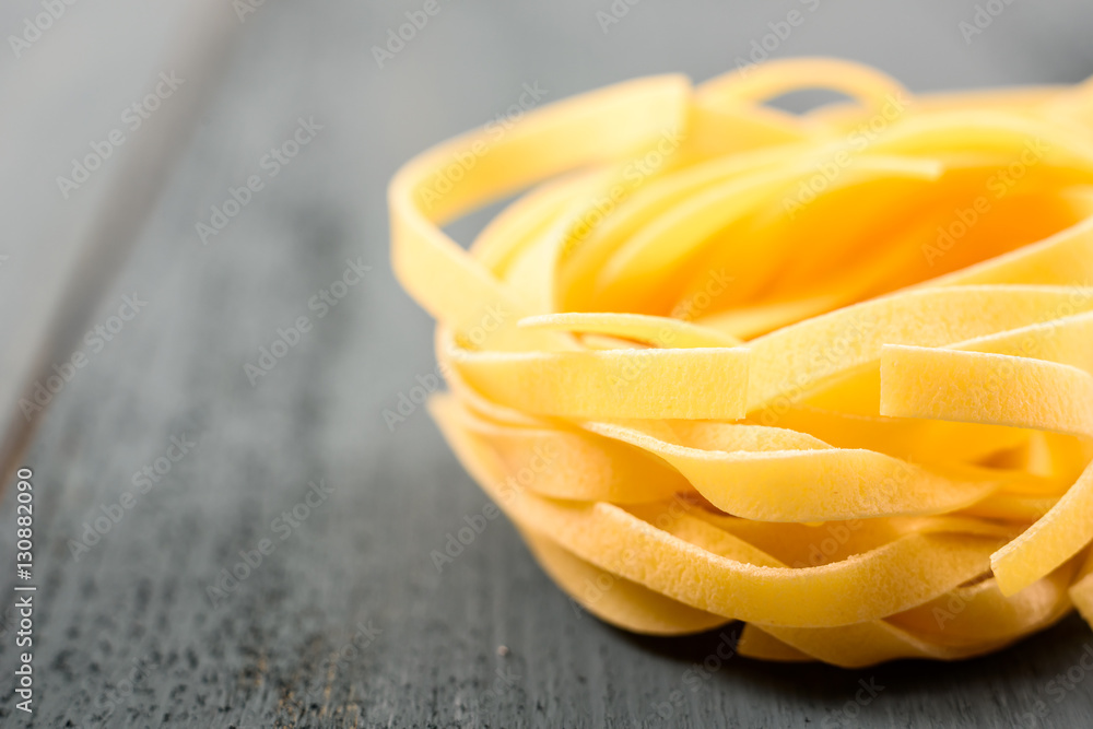 Italian Tagliatelle Pasta On Wood Table