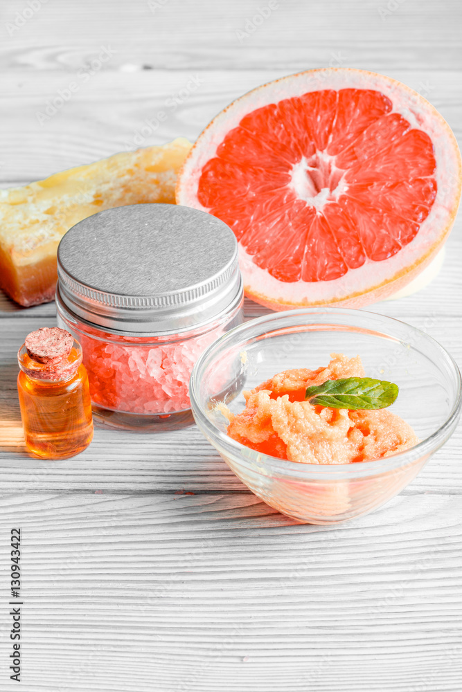 organic cosmetic with citrus on wooden background