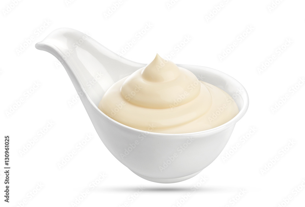 Mayonnaise sauce in bowl isolated on white background with clipping path