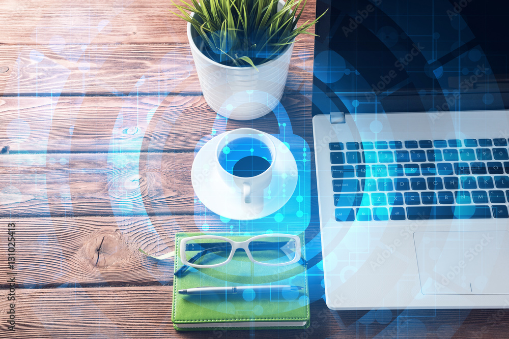 Business workplace with laptop coffee cup and security concept on screen