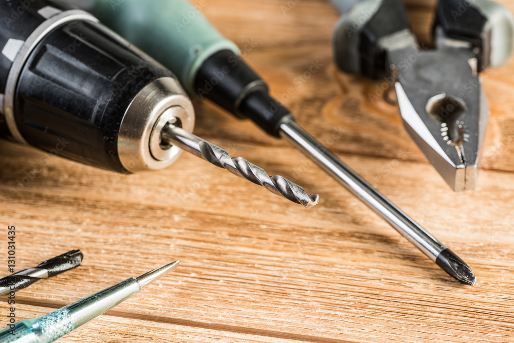 Carpentry tools on wooden surface