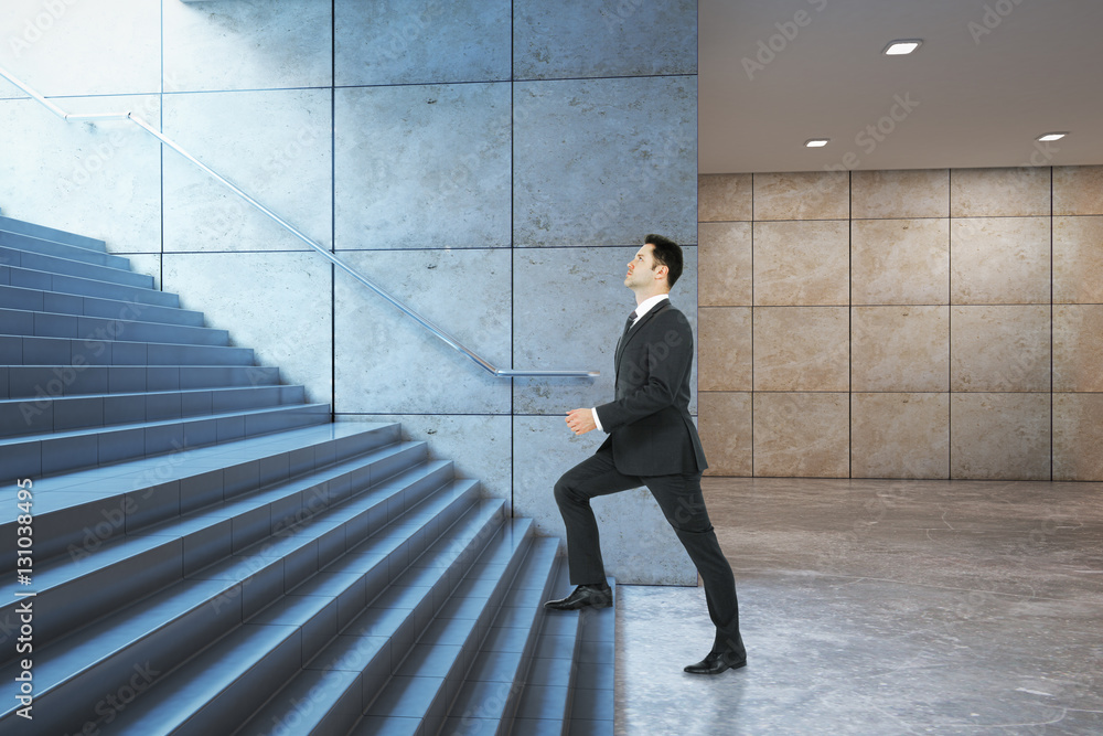 Businessman climbing success stairs side