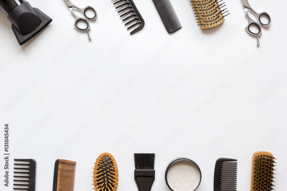 Tools for hair styling on white background top view