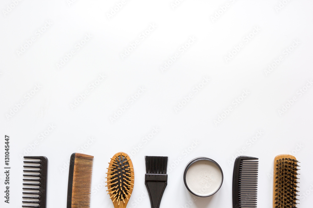 Tools for hair styling on white background top view