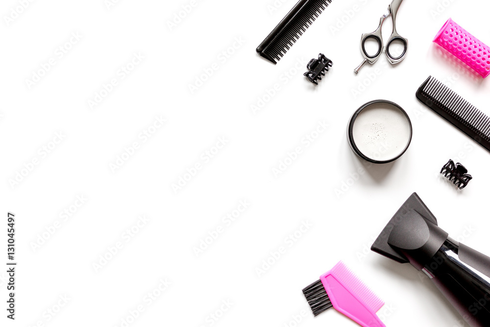 Tools for hair styling on white background top view