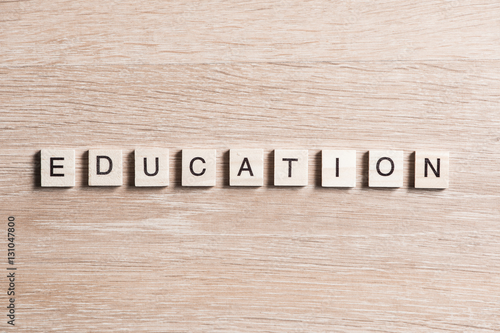 wooden elements with the letters collected in the word education