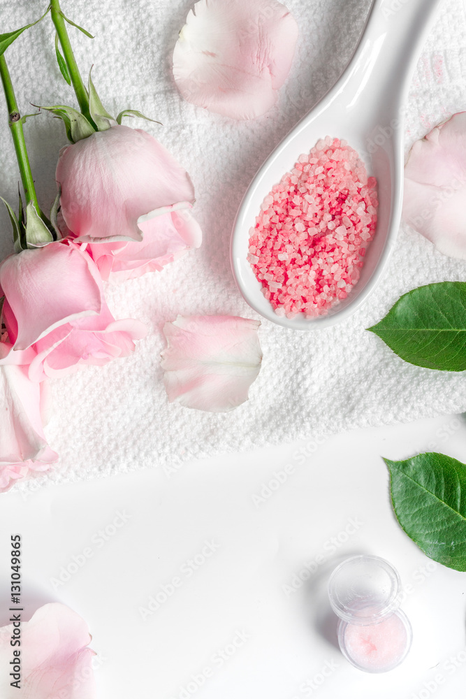 organic cosmetic with rose oil on white background top view