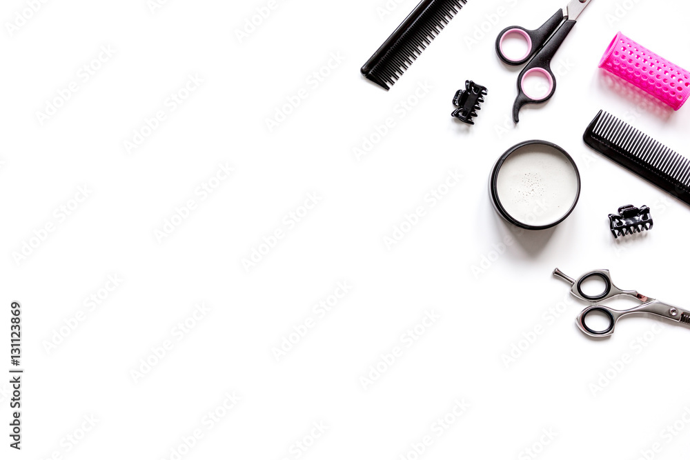 Tools for hair styling on white background top view