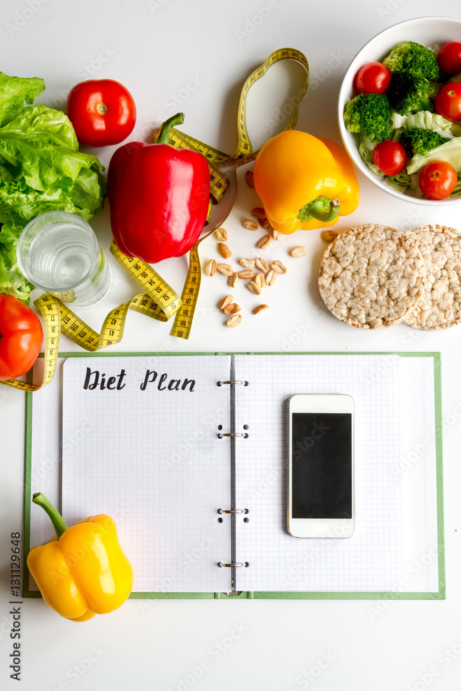 concept diet, slimming plan with vegetables top view mock up