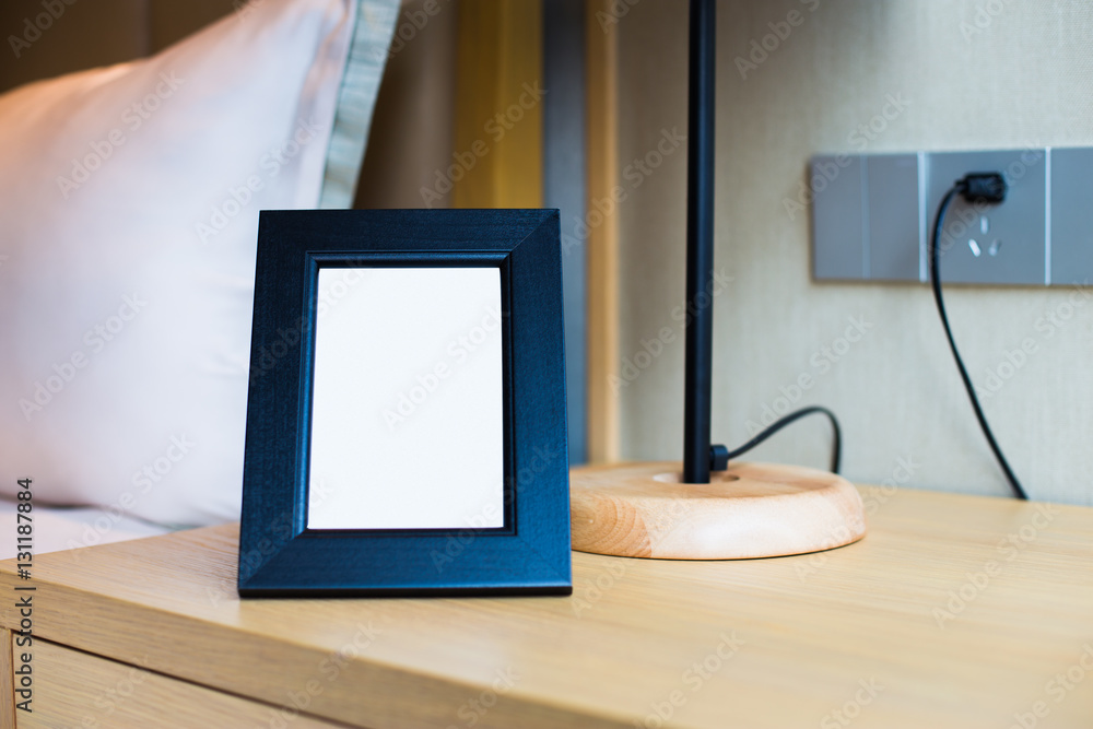 night table with frame in modern bedroom