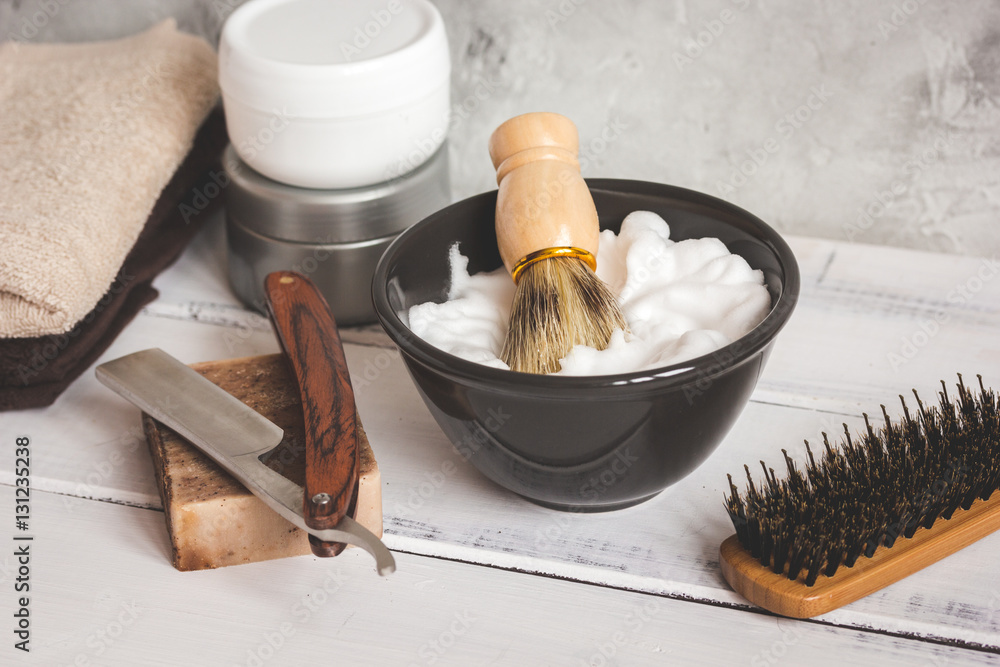 Wooden desktop with tools for shaving beards