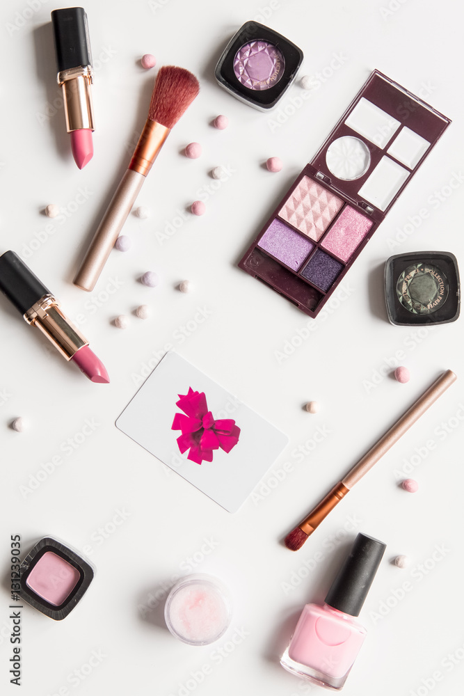 concept online shopping cosmetics on white background top view