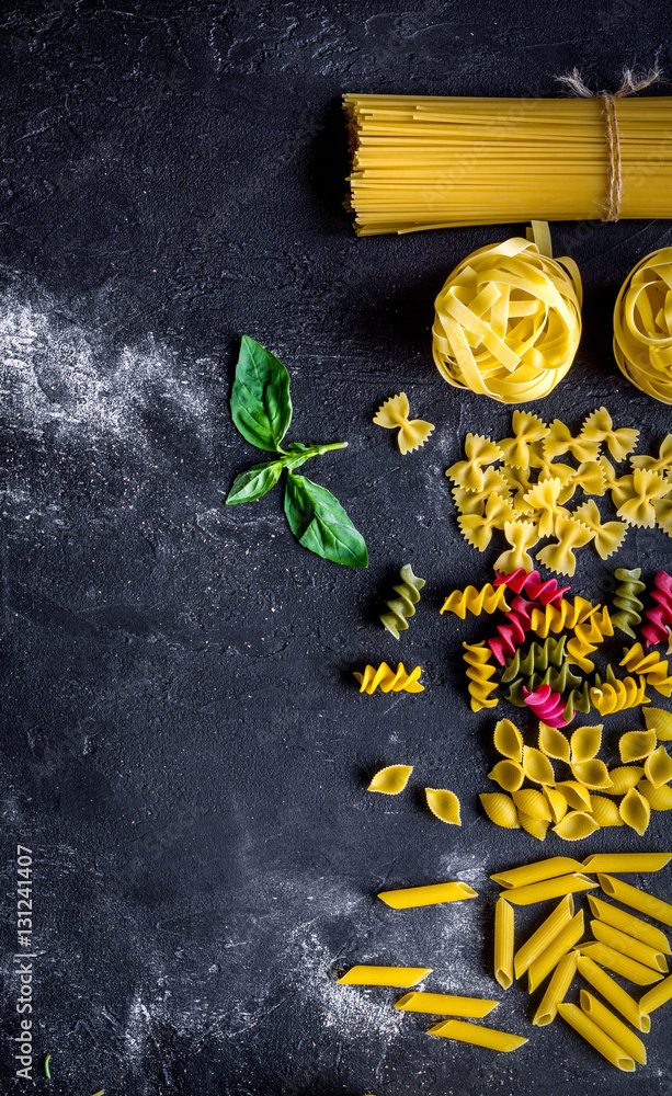 various kinds of paste on dark background top view