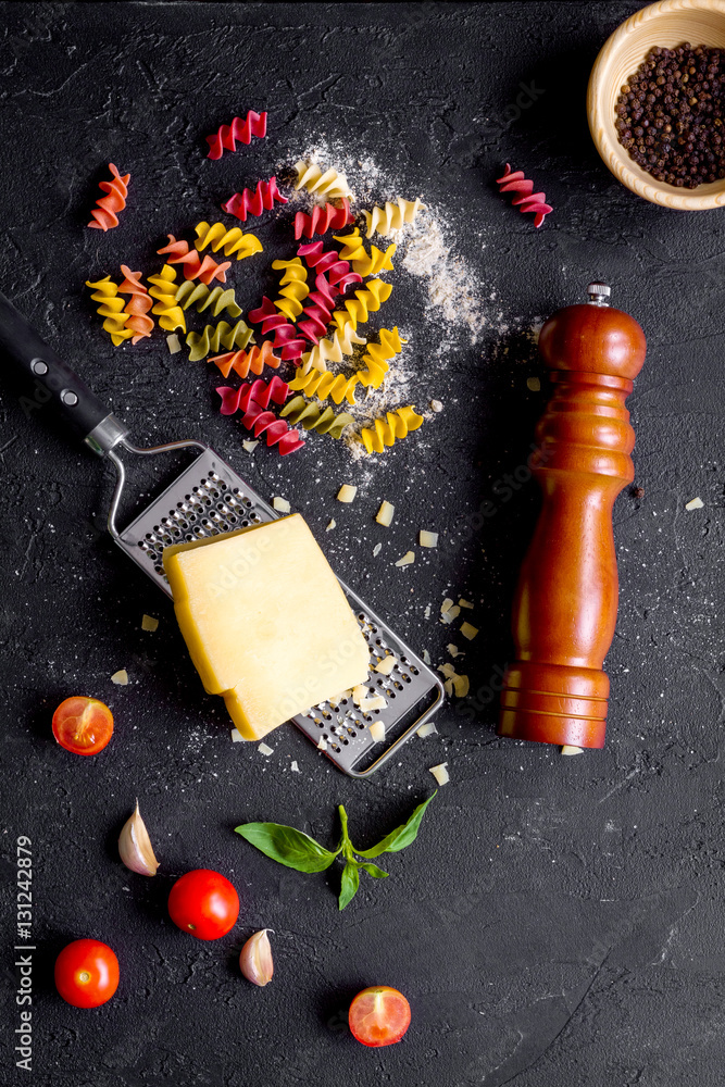 ingredients for cooking paste on dark background top view