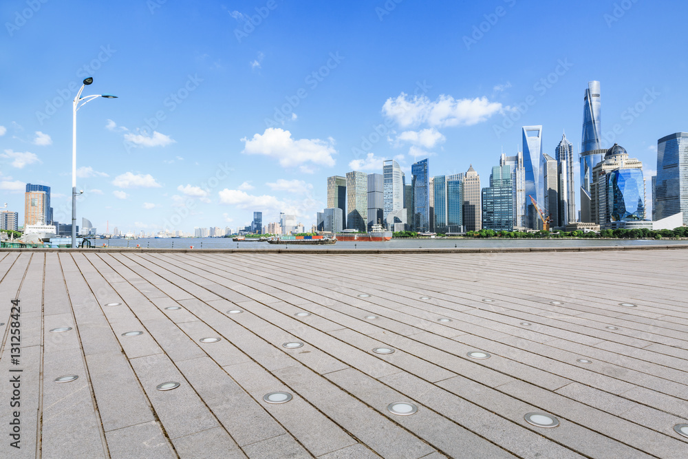 Empty floor with modern skyline and buildings in Shanghai