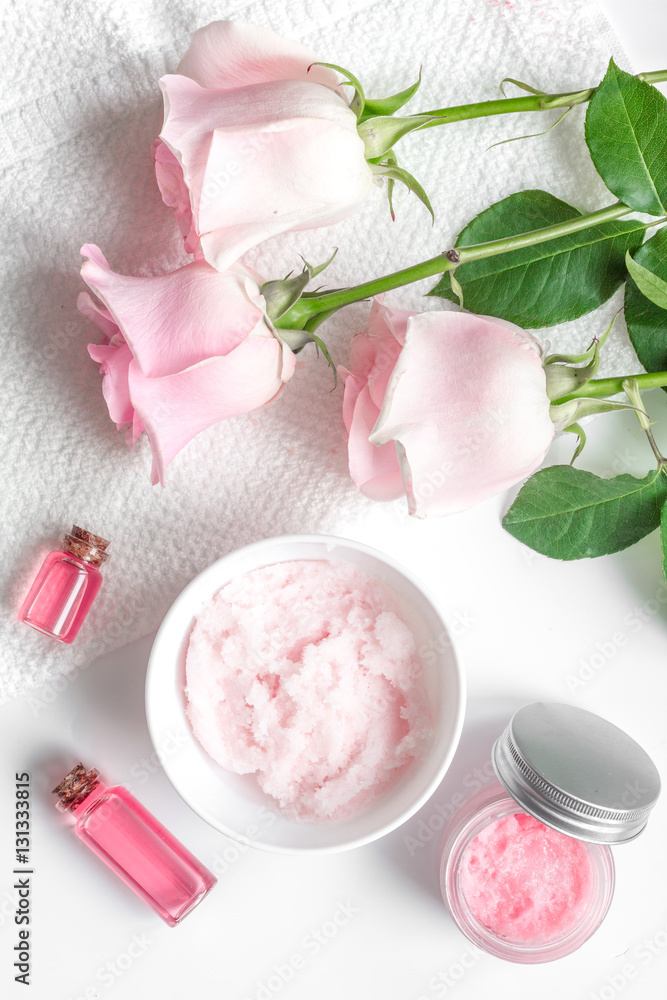 organic cosmetic with rose oil on white background top view