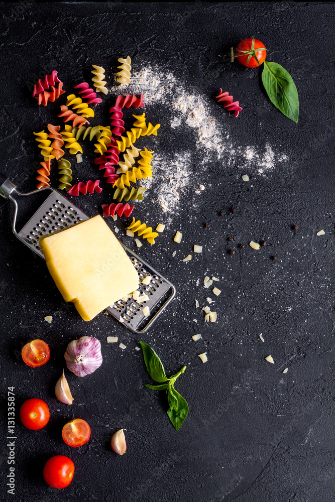 ingredients for cooking paste on dark background top view