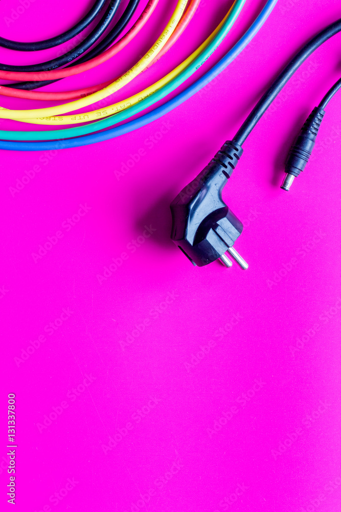 concept network internet cable on pink background close up