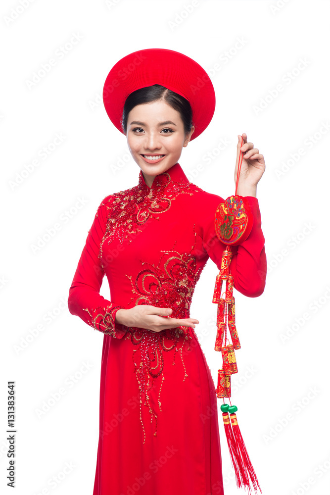 Portrait of a beautiful Asian woman on traditional festival Ao Dai.