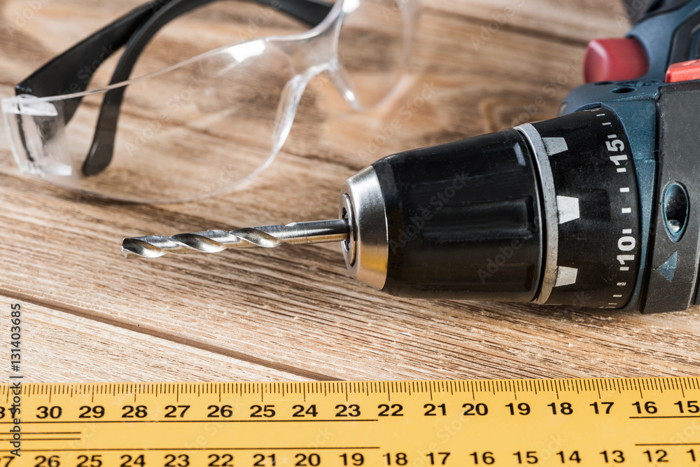 Carpentry tools on wooden surface