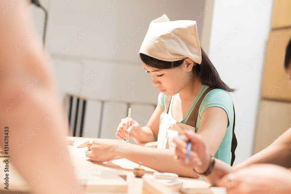 woman woodworking smile happily