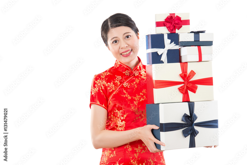 Joyful woman holding shopping a lot of boxes