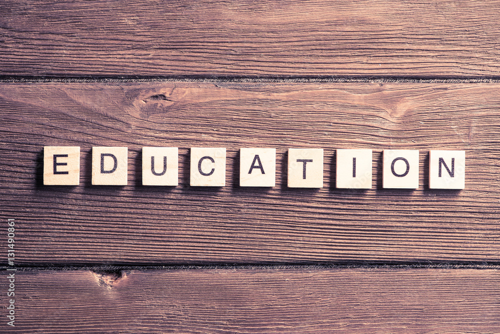 wooden elements with the letters collected in the word education