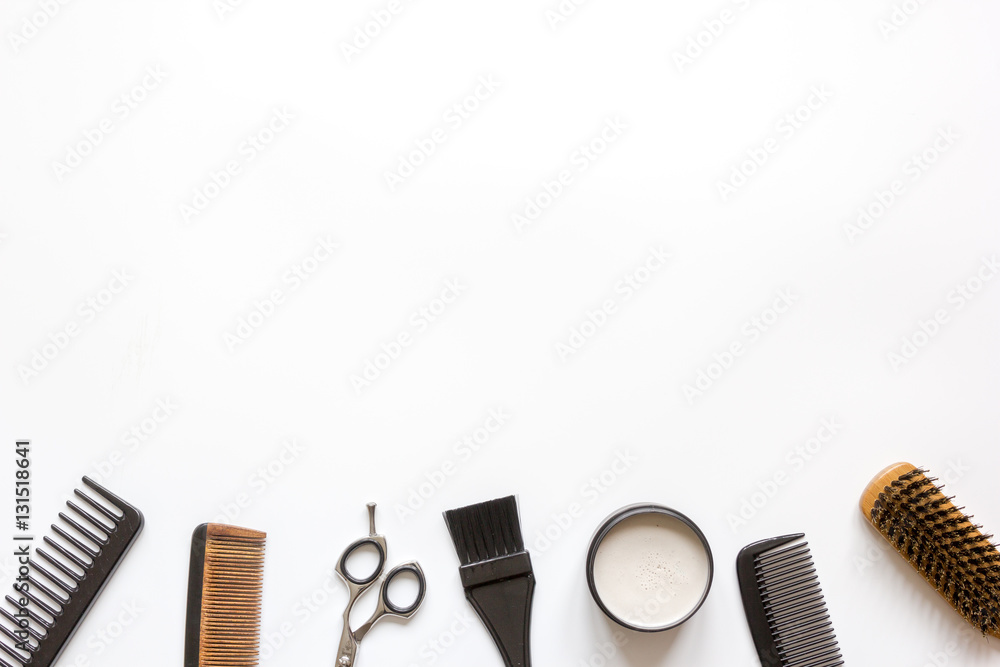 Tools for hair styling on white background top view