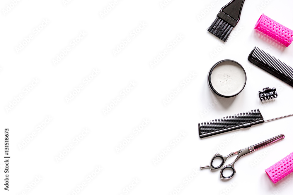 Tools for hair styling on white background top view