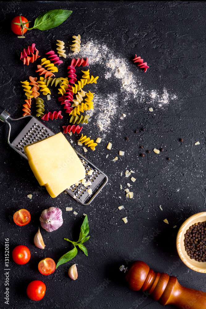 ingredients for cooking paste on dark background top view