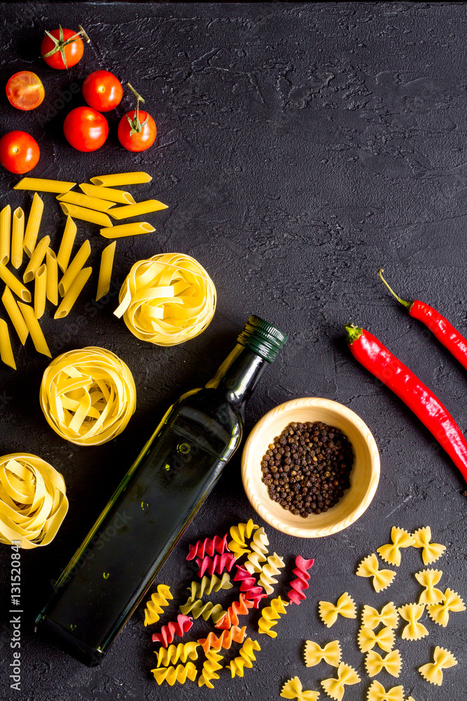 ingredients for cooking paste on dark background top view